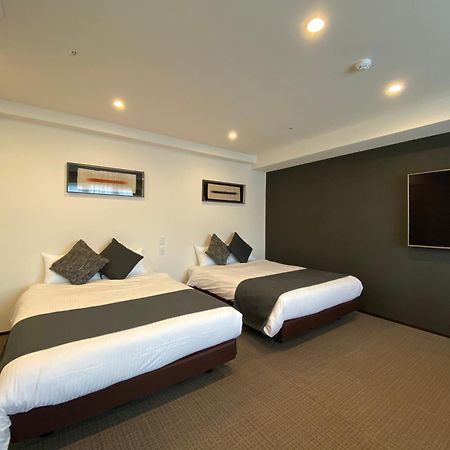 Randor Hotel Sapporo Suites Exterior foto A room at the hotel