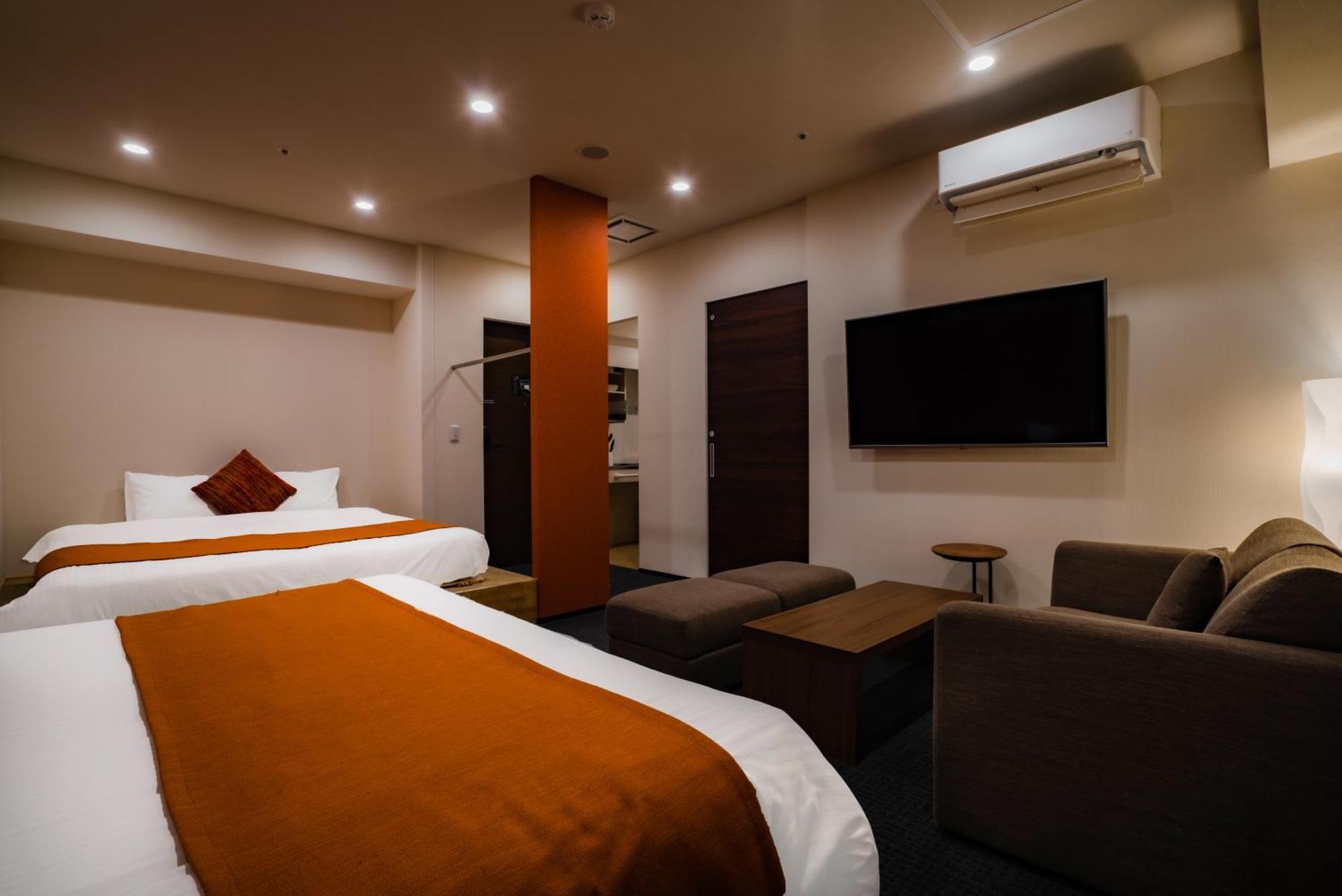 Randor Hotel Sapporo Suites Zimmer foto A room at the hotel
