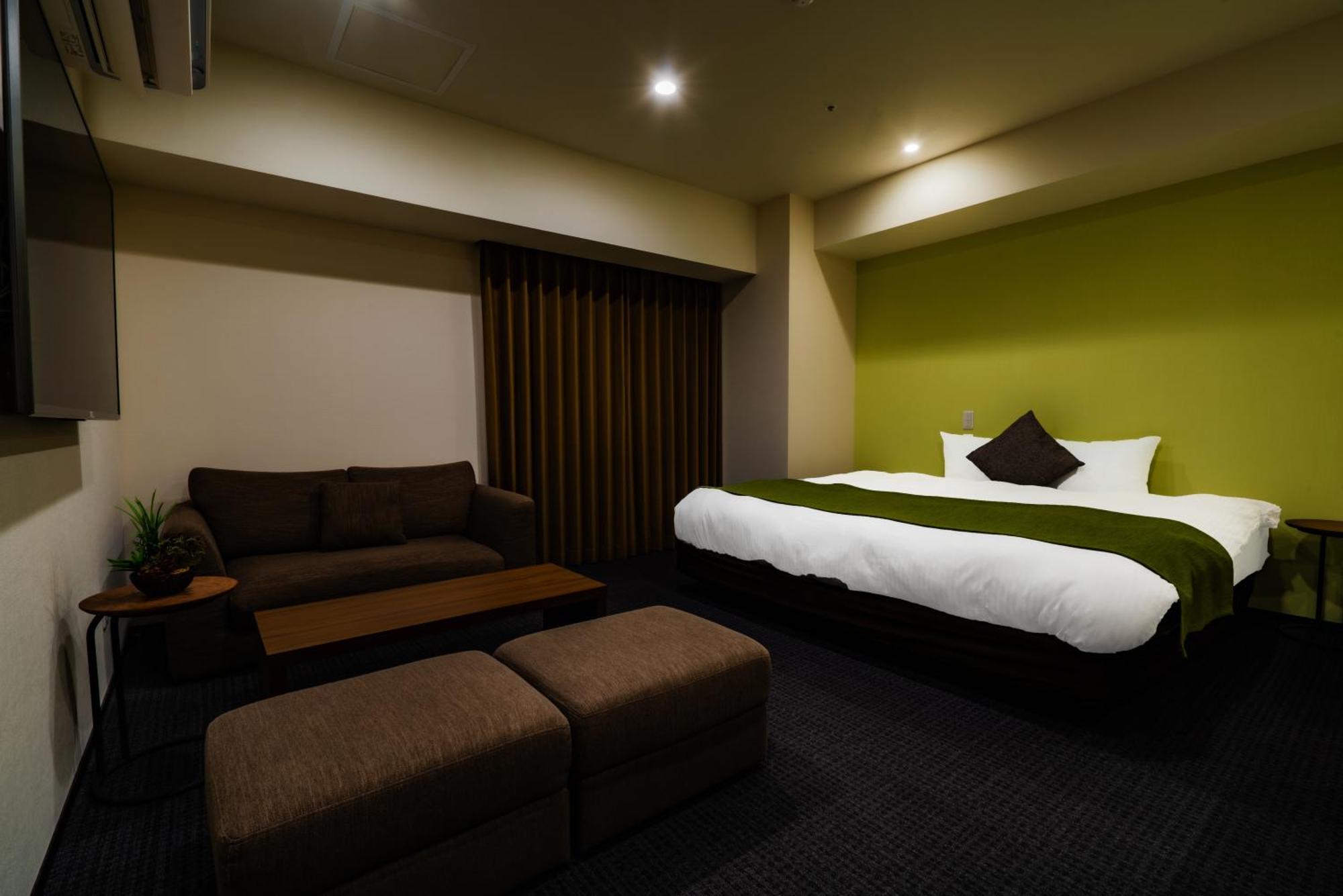 Randor Hotel Sapporo Suites Zimmer foto A room at the hotel