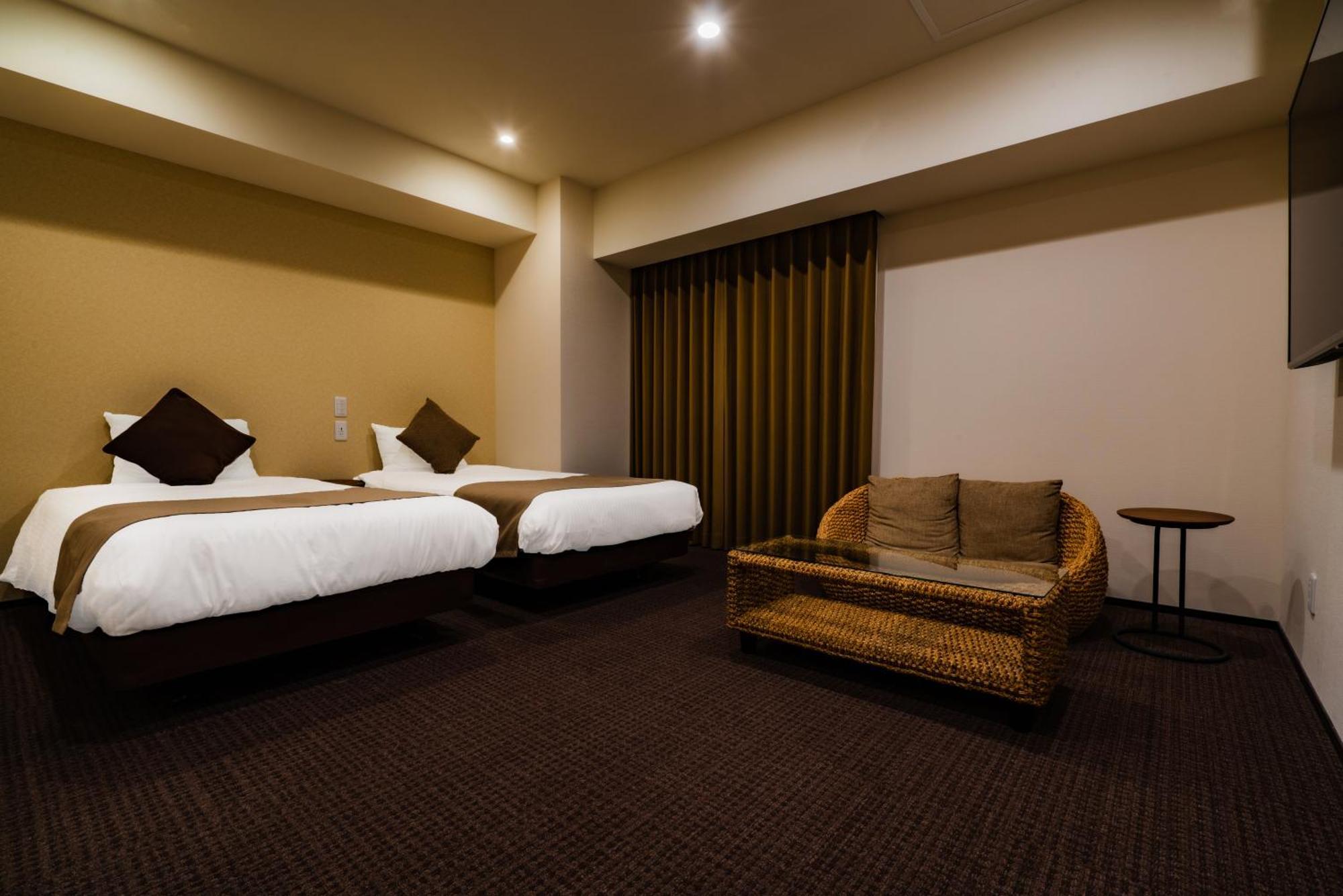 Randor Hotel Sapporo Suites Zimmer foto A room at the hotel