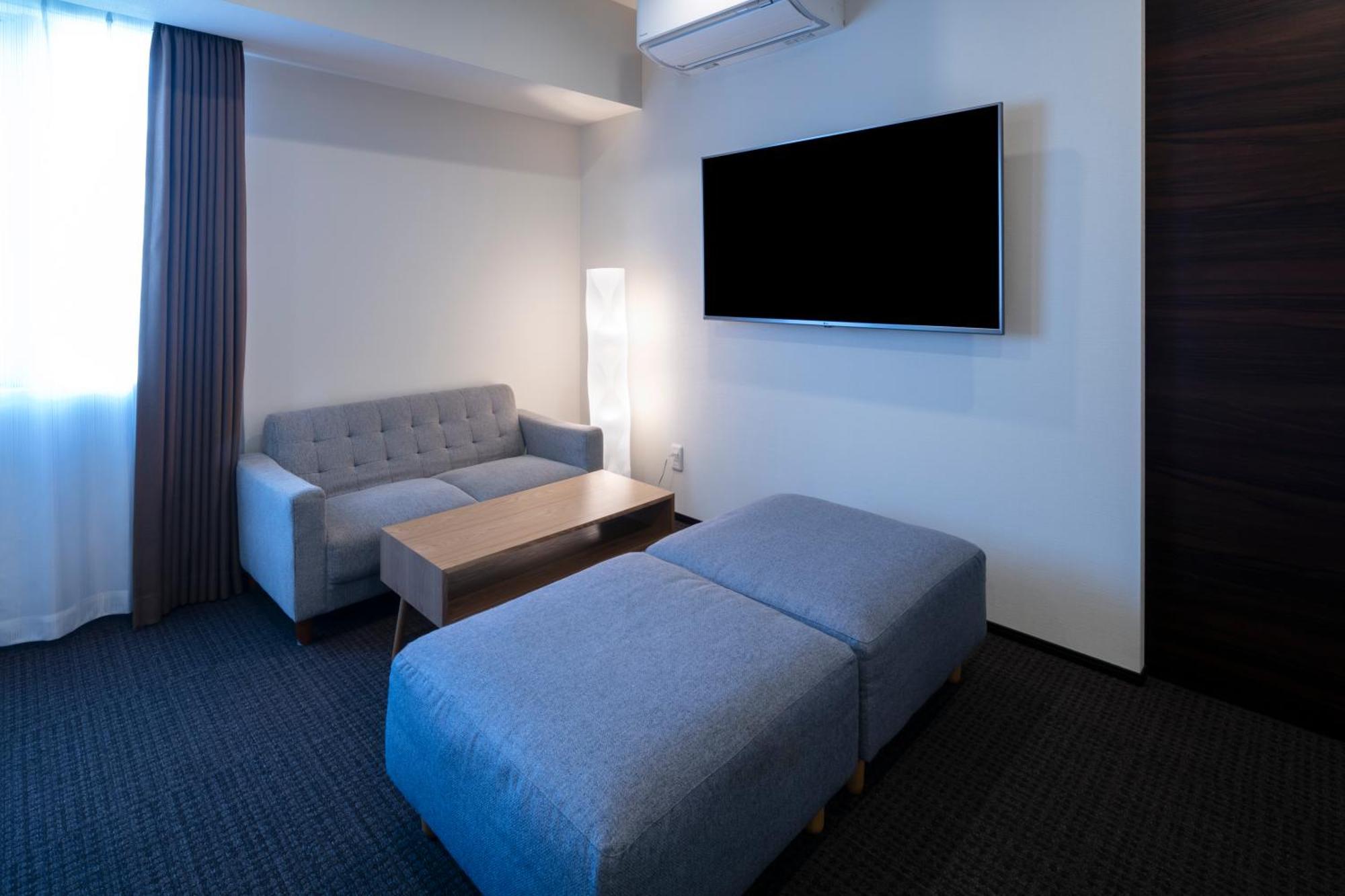Randor Hotel Sapporo Suites Zimmer foto A room at the hotel