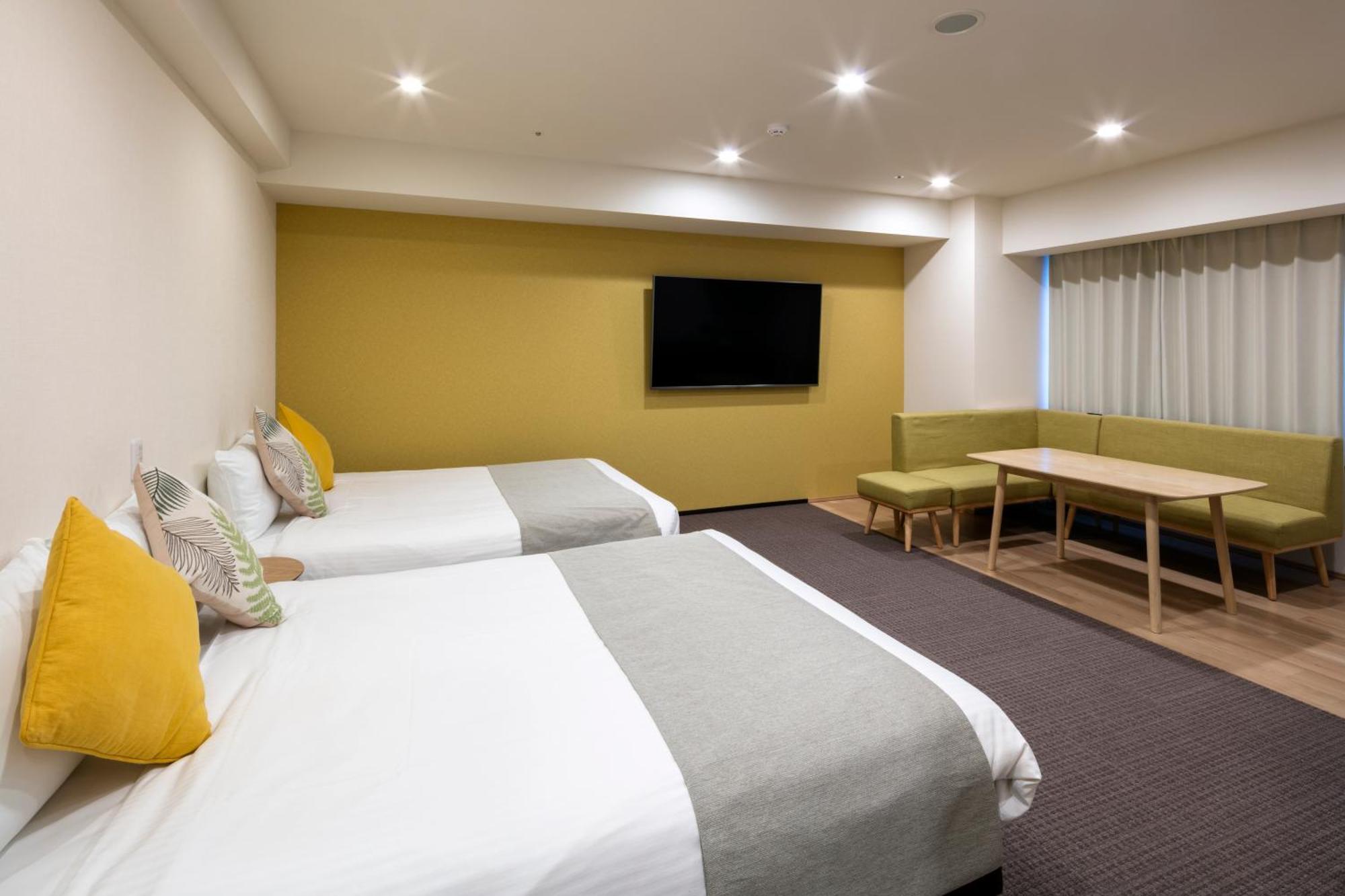 Randor Hotel Sapporo Suites Zimmer foto A room at the hotel