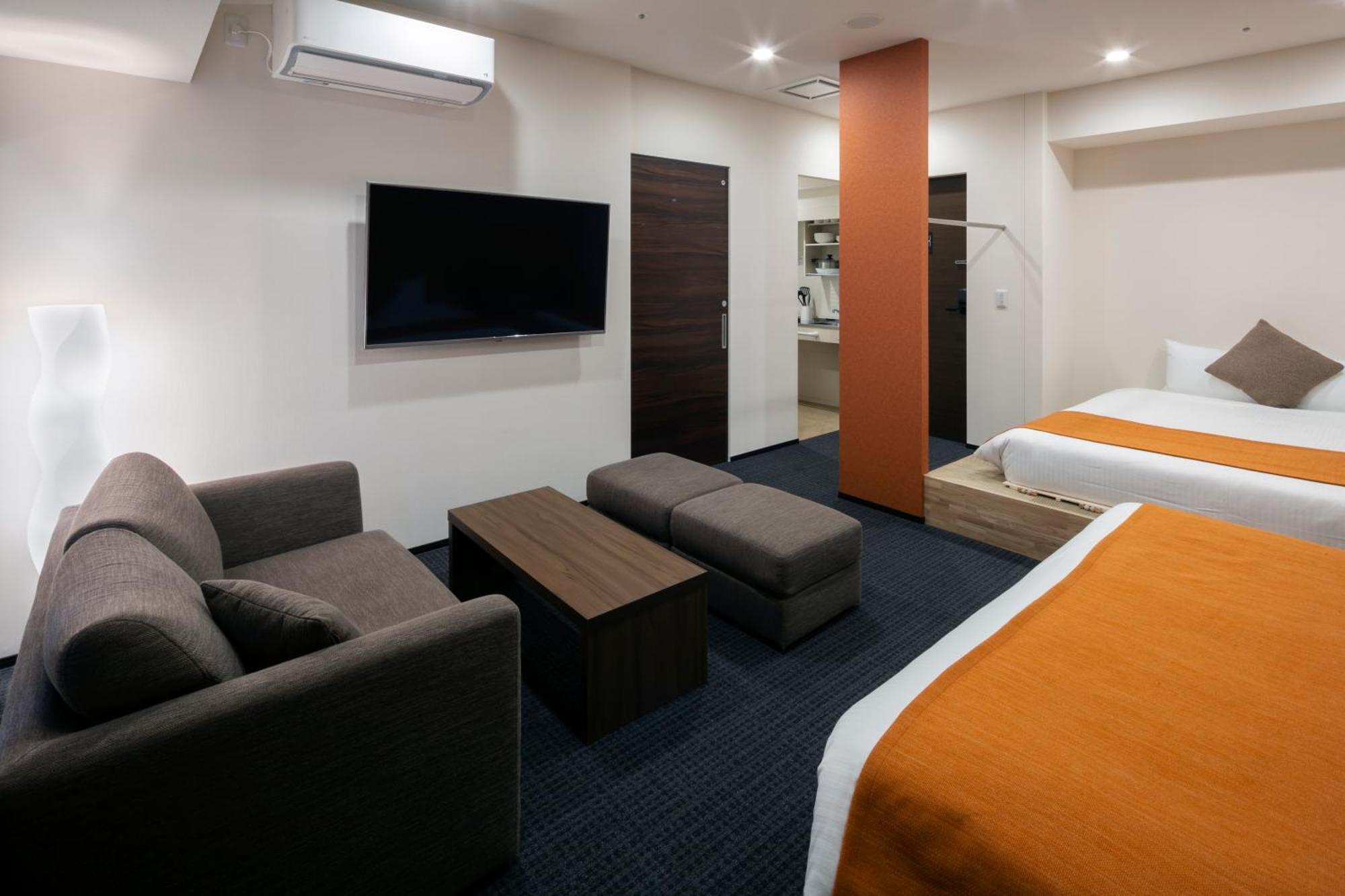 Randor Hotel Sapporo Suites Zimmer foto A room at the hotel