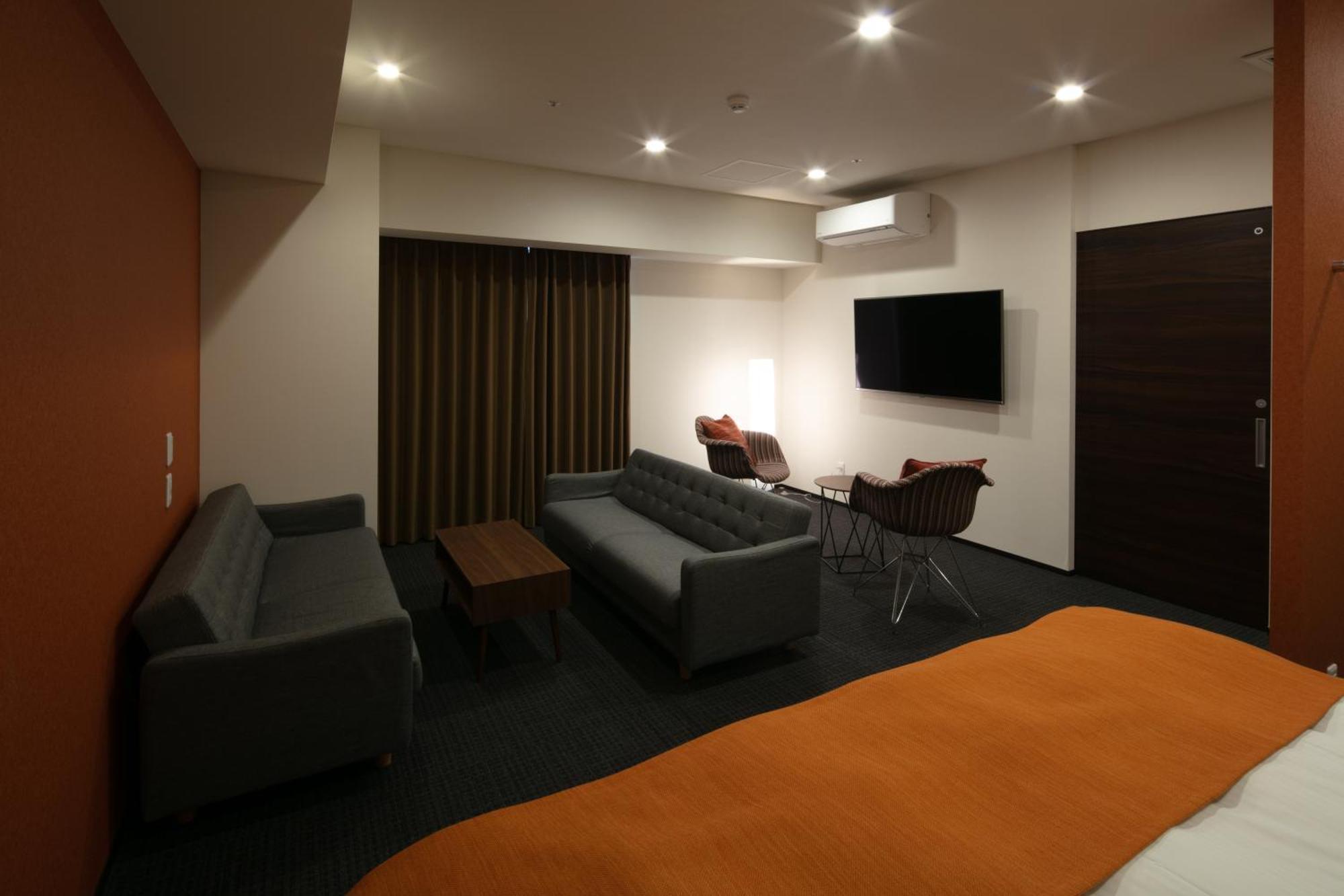 Randor Hotel Sapporo Suites Zimmer foto A room at the hotel