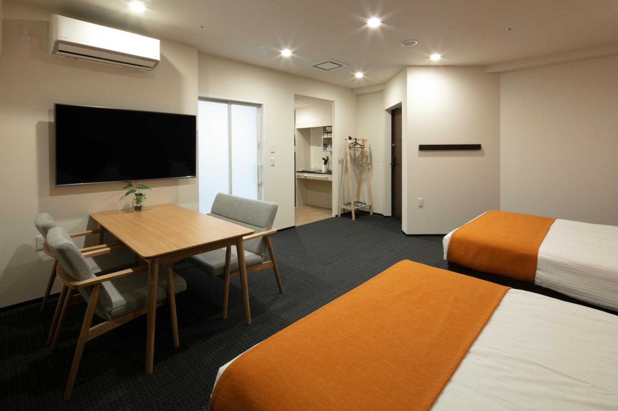 Randor Hotel Sapporo Suites Zimmer foto A typical room at the hotel