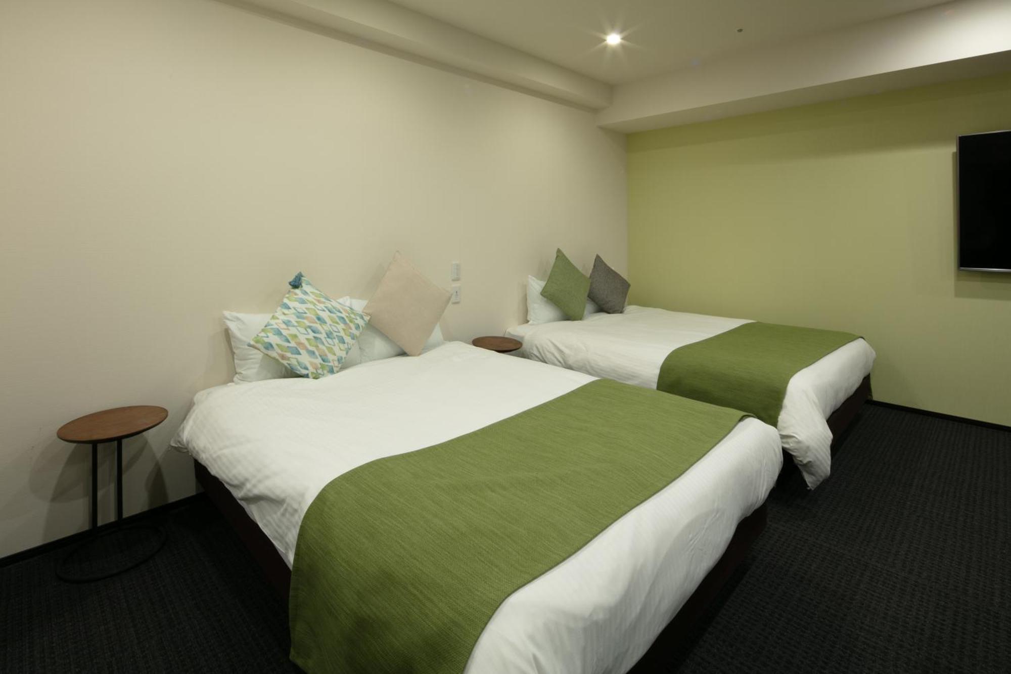 Randor Hotel Sapporo Suites Zimmer foto A room at the hotel